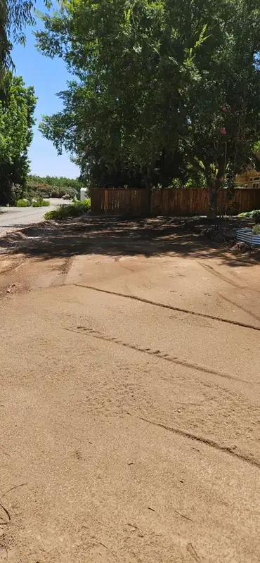 Cleared yard and driveway after a full cleanout